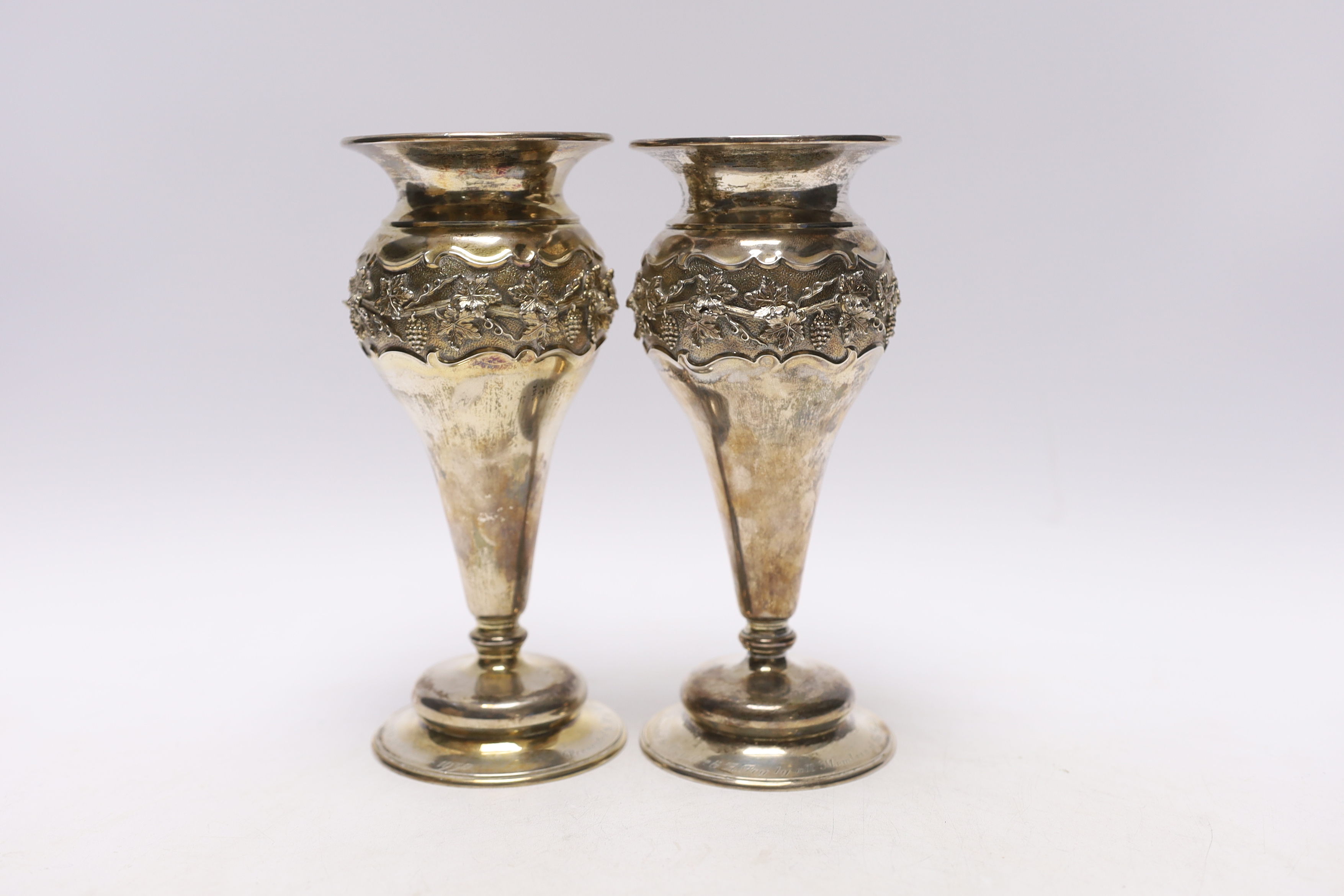 A pair of George V silver mounted posy vases, with engraved presentation inscriptions, London, 1912, 18.6cm.